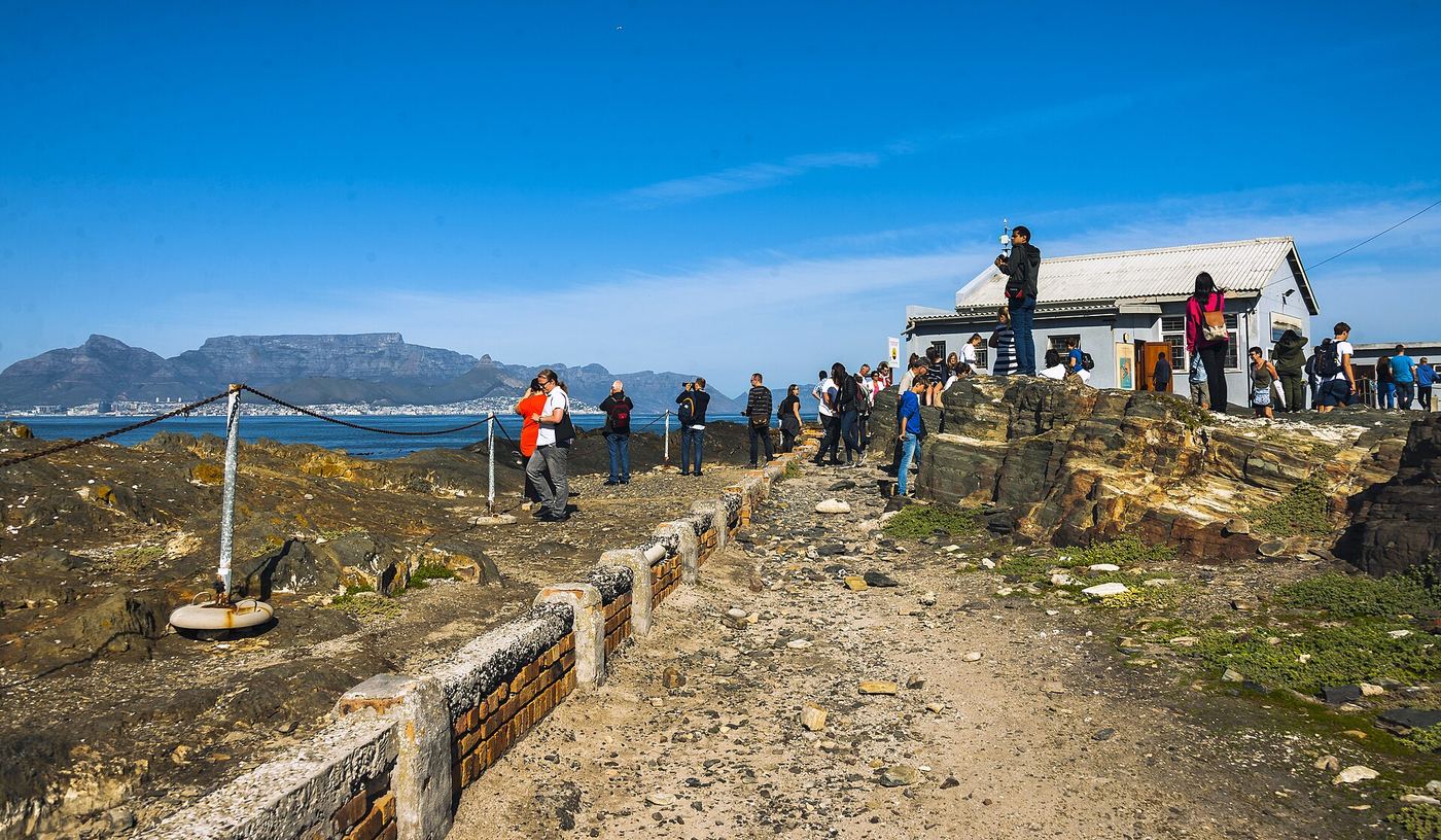 Tourists taking in the view to Cape Town from the southern end of Robben Island